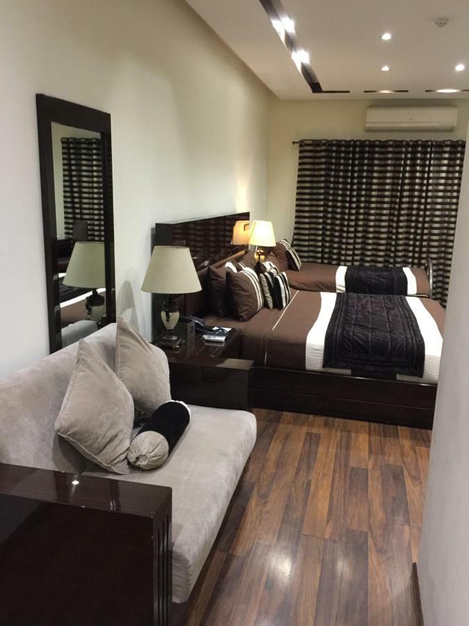 Royaute Luxury Suites And Hotel Gulberg Lahore Eksteriør billede